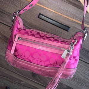 Pink Coach handbag with tassel zipper